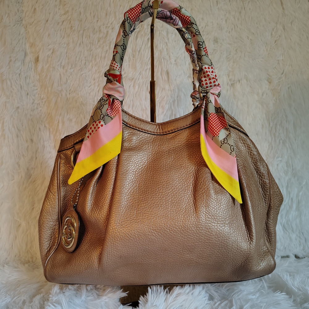 Elegant Tan Leather Handbag with Scarf Accent
